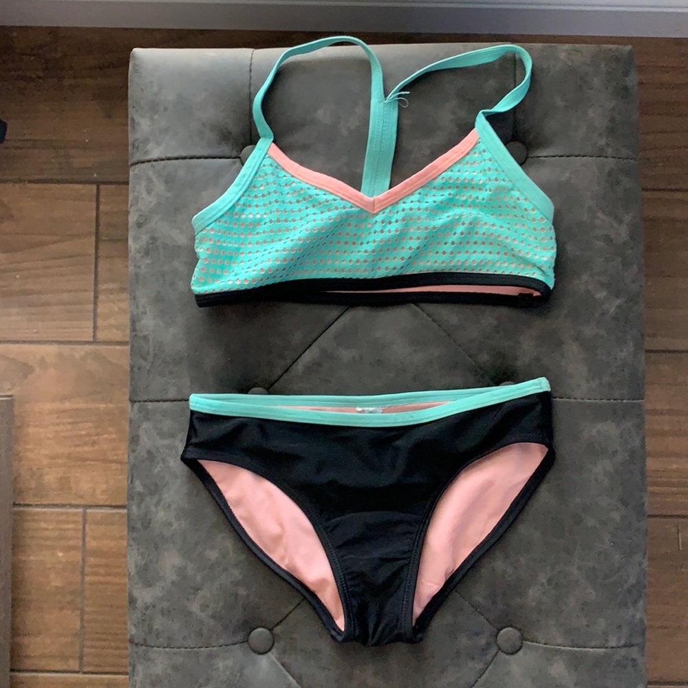 Size- M 7/8. Pinkish tan, teal, and black.2 piece!